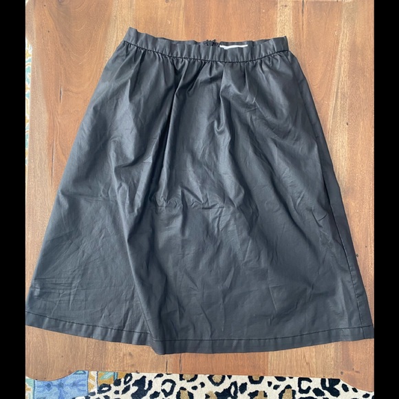 BCBGeneration Dresses & Skirts - BCBGeneration Black skirt coated material size 6